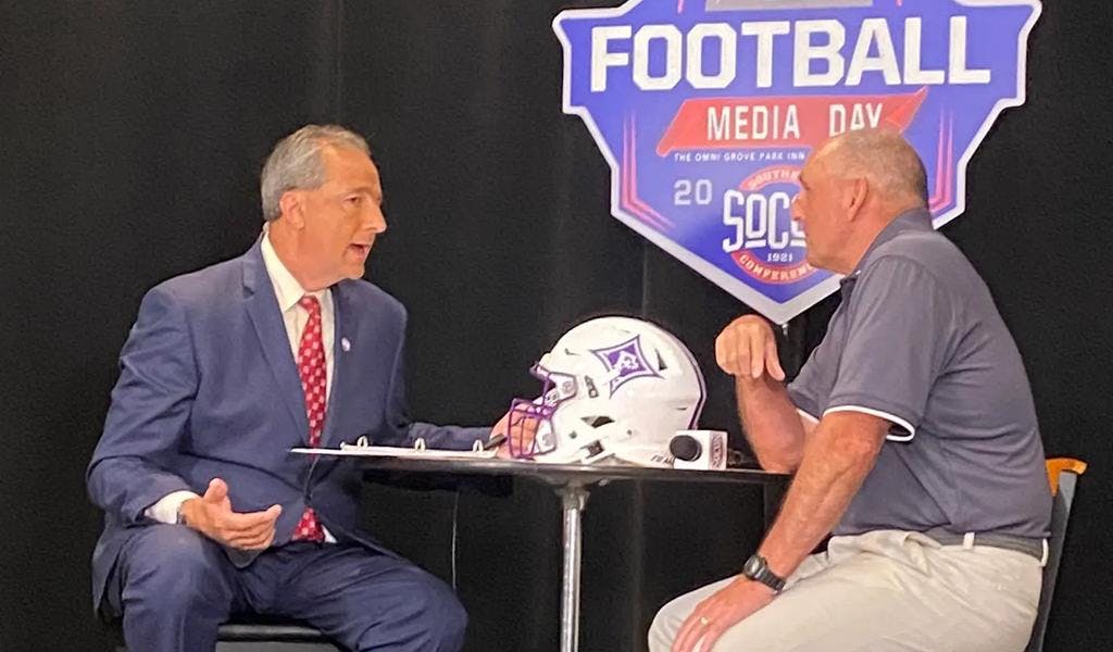Furman Head Coach Clay Hendrix being interviewed during the 2022 SoCon Media Day
