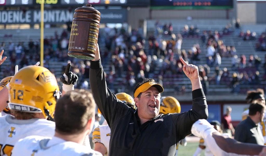 Idaho Vandals head coach Jason Eck holds up the Little Brown Stein after the Vandals defeat the Griz during the Big Sky Conference football game between the Griz and Idaho at Washington-Grizzly Stadium, Saturday, Oct. 15, 2022.